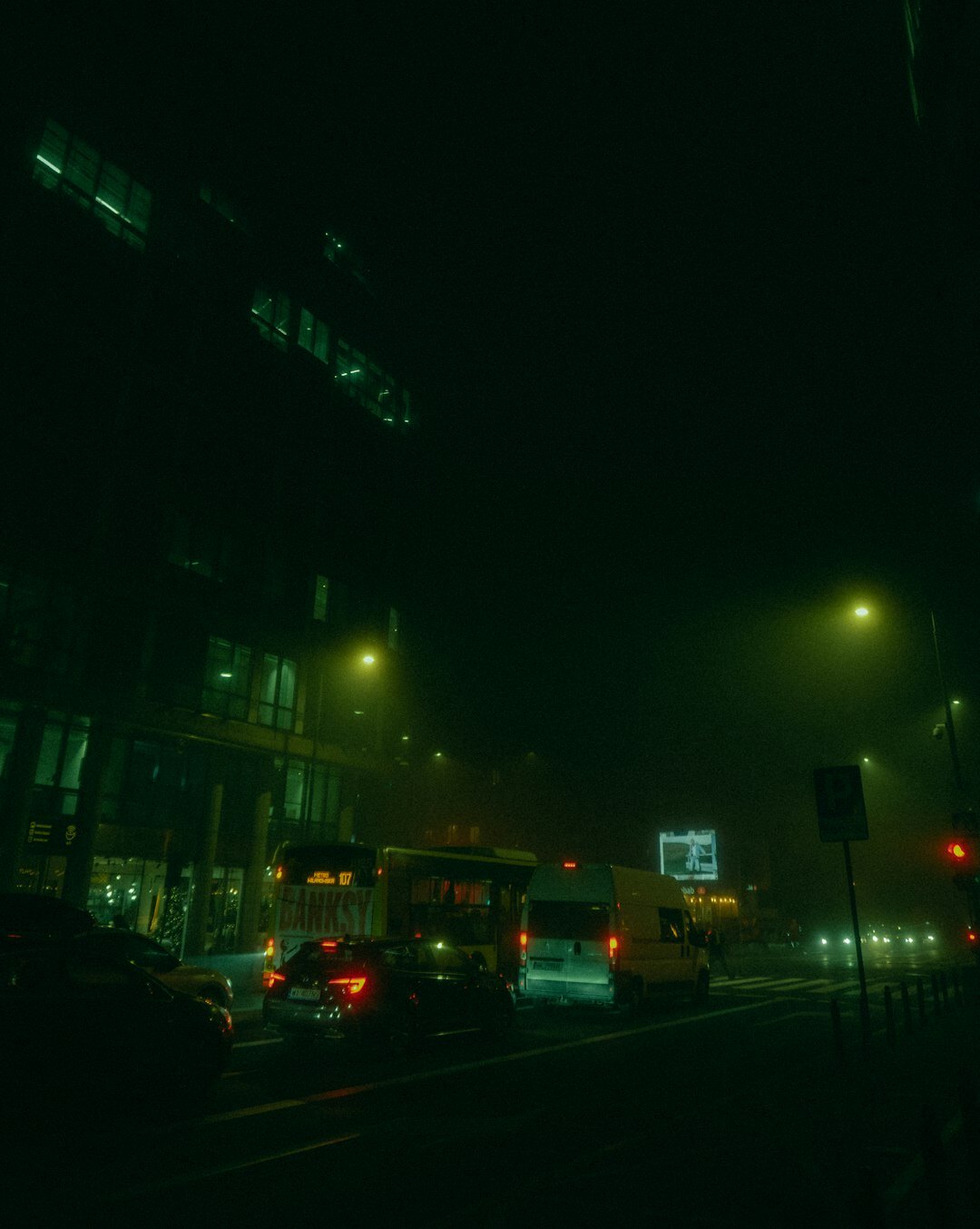 foggy city street at night