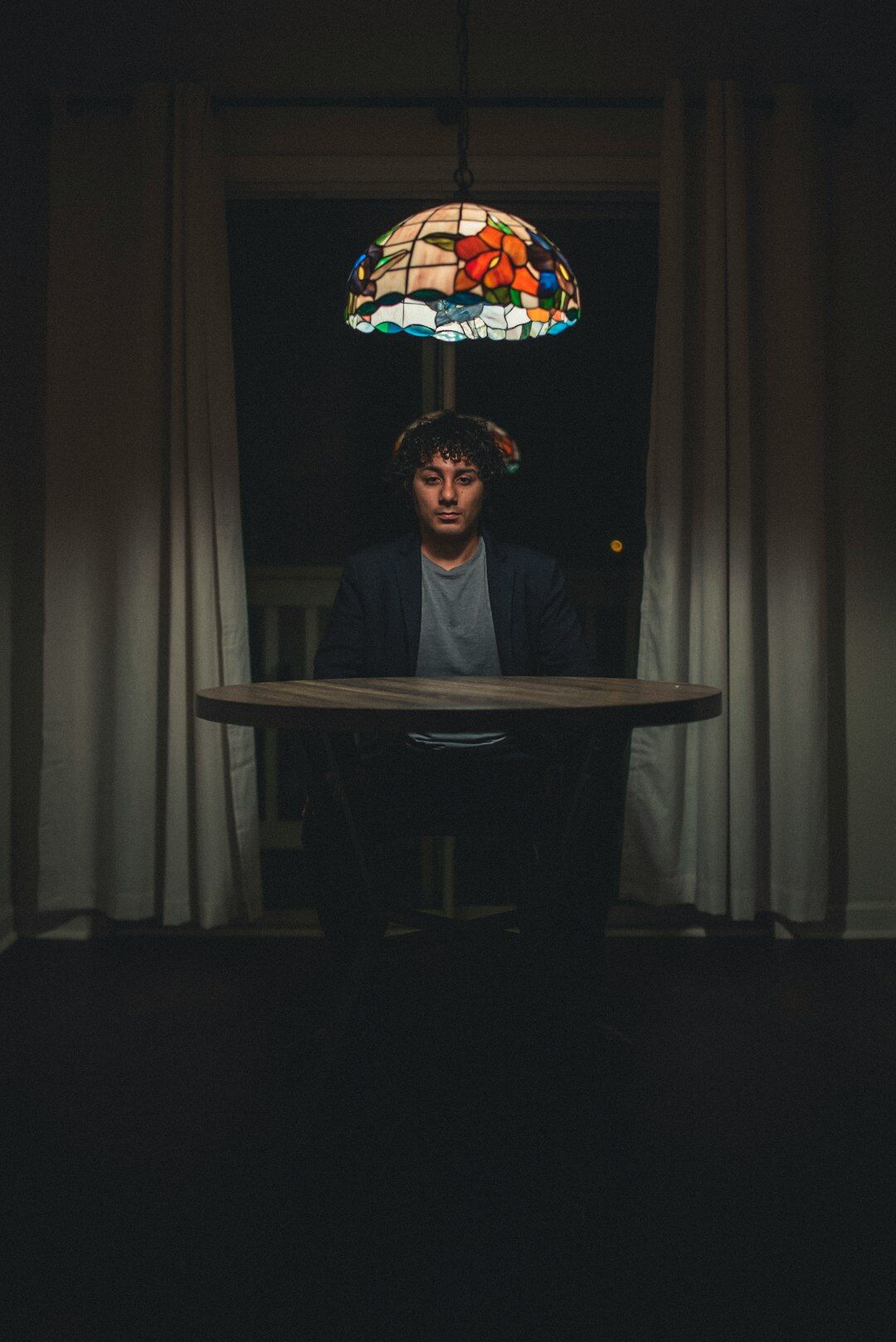writer in dark room at night