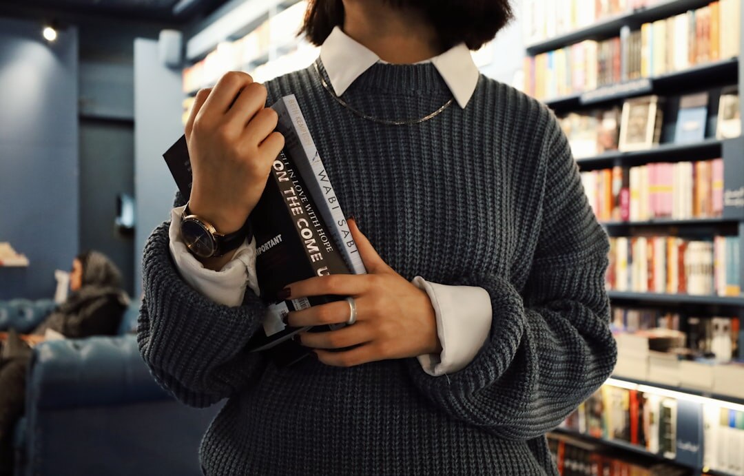 woman reading mystery book